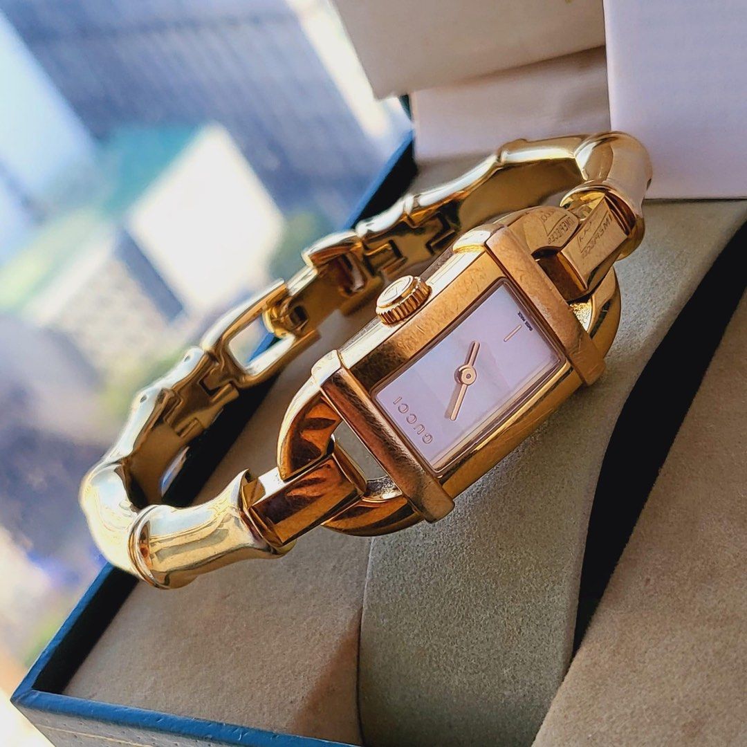 Preowned GUCCI Bamboo 6800L Mother of Pearl Dial Bangle Gold Watch