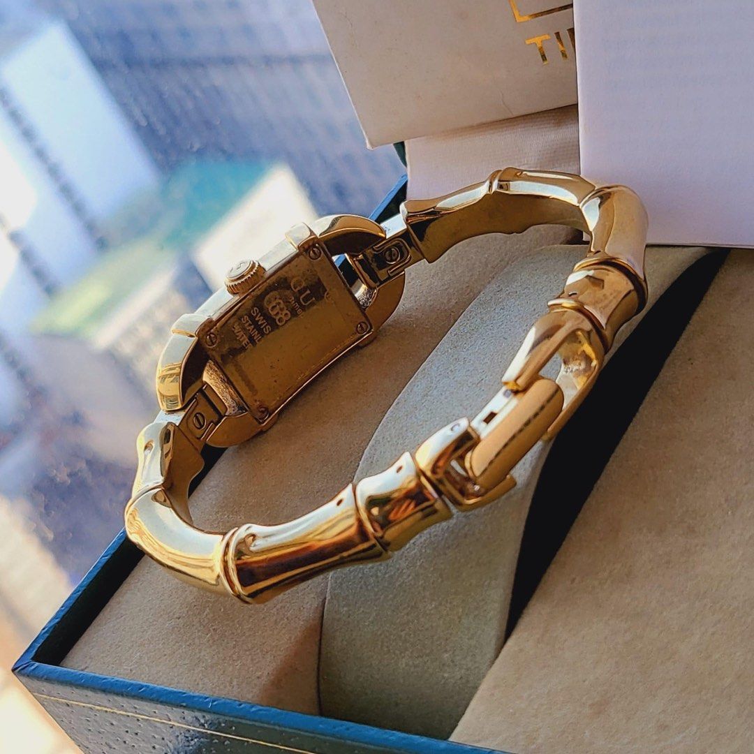 Preowned GUCCI Bamboo 6800L Mother of Pearl Dial Bangle Gold Watch