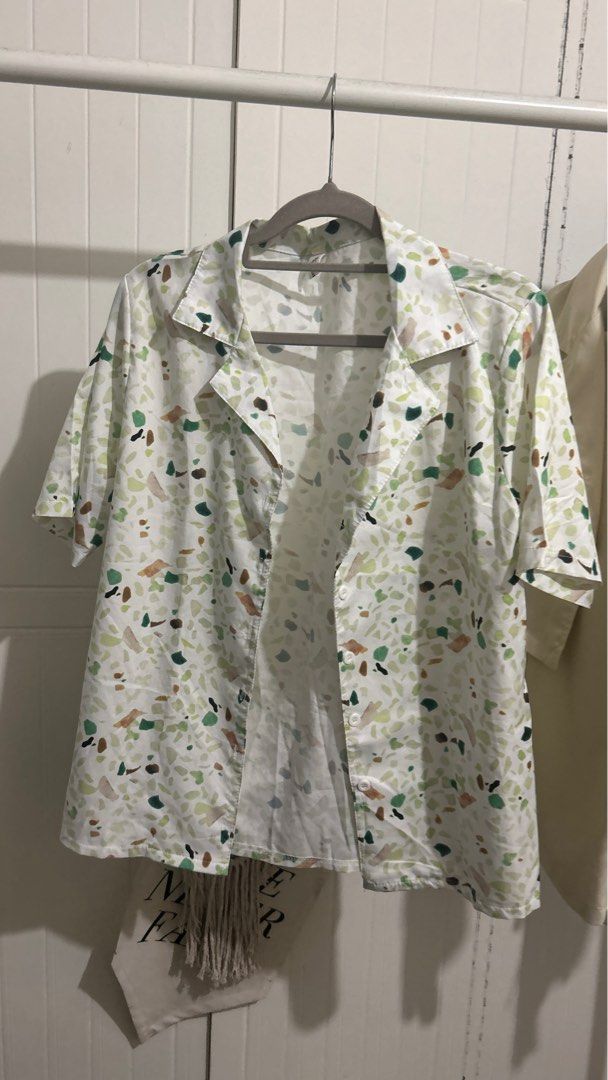 Printed Polo (Category: Blouses) located in Quezon City. Submitted by superchargerr (Listing ID 1309820059, Image 1). Description: Worn once Can fit up to medium.