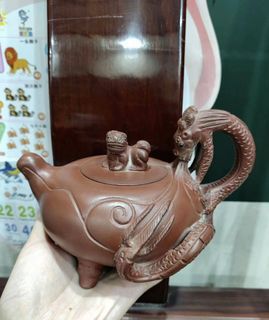 Purple clay teapot early old cement three-legged crouching Tiger Hidden dragon pot