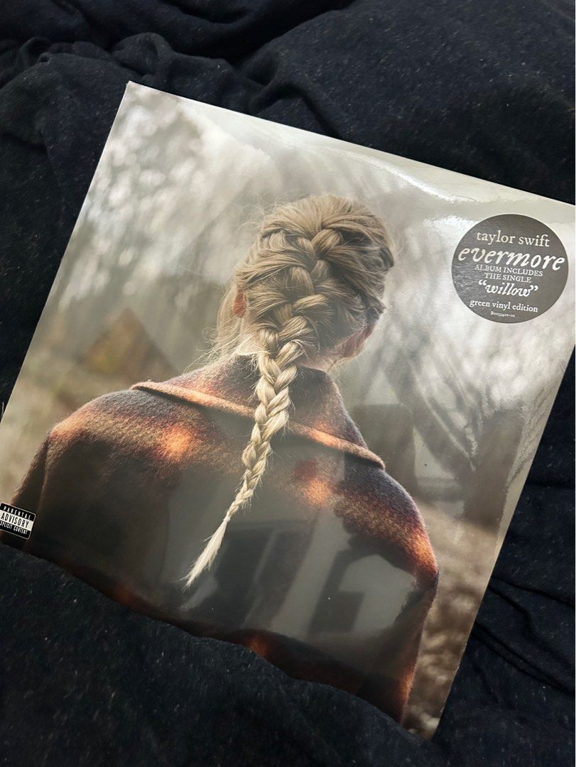 Taylor Swift - Evermore Vinyl (Category: Vinyls) located in Makati City. Submitted by jeon_wonw00 (Listing ID 1309889861, Image 1). Description: Green colored.