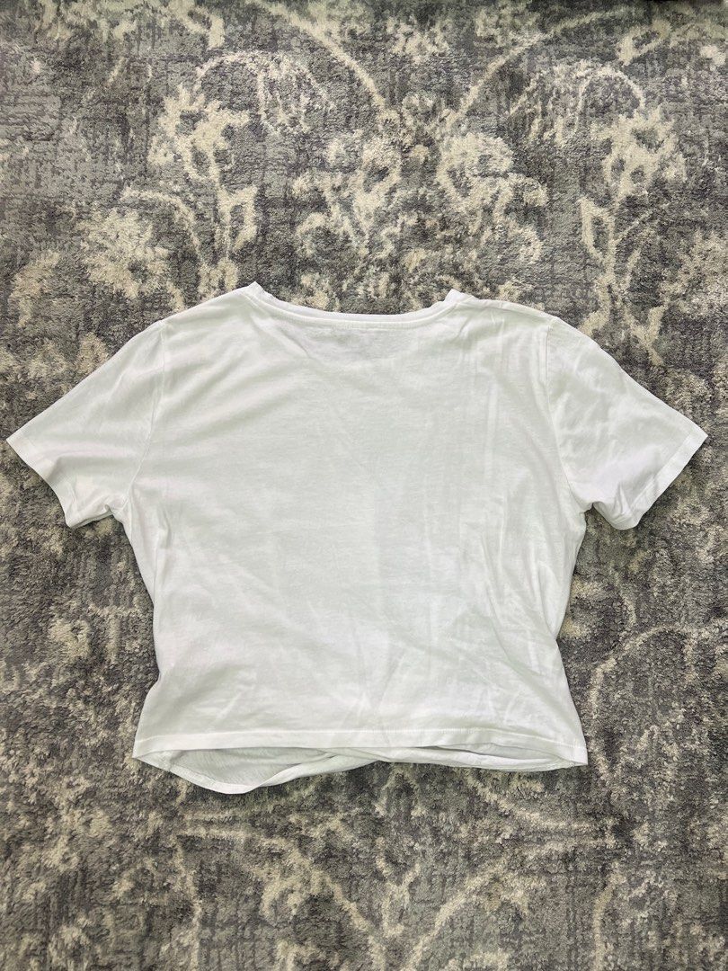 Zara shirts bundle (Category: Shirts) located in Pasay City. Submitted by netuy (Listing ID 1309750266, Image 3). Description: Cotton cropped shirts with center knot. Bundle of 3 - plain white & 2 striped shirts. Size large but can fit medium to large. Very flattering fit. .