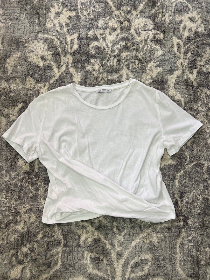 Zara shirts bundle (Category: Shirts) located in Pasay City. Submitted by netuy (Listing ID 1309750266, Image 2). Description: Cotton cropped shirts with center knot. Bundle of 3 - plain white & 2 striped shirts. Size large but can fit medium to large. Very flattering fit. .