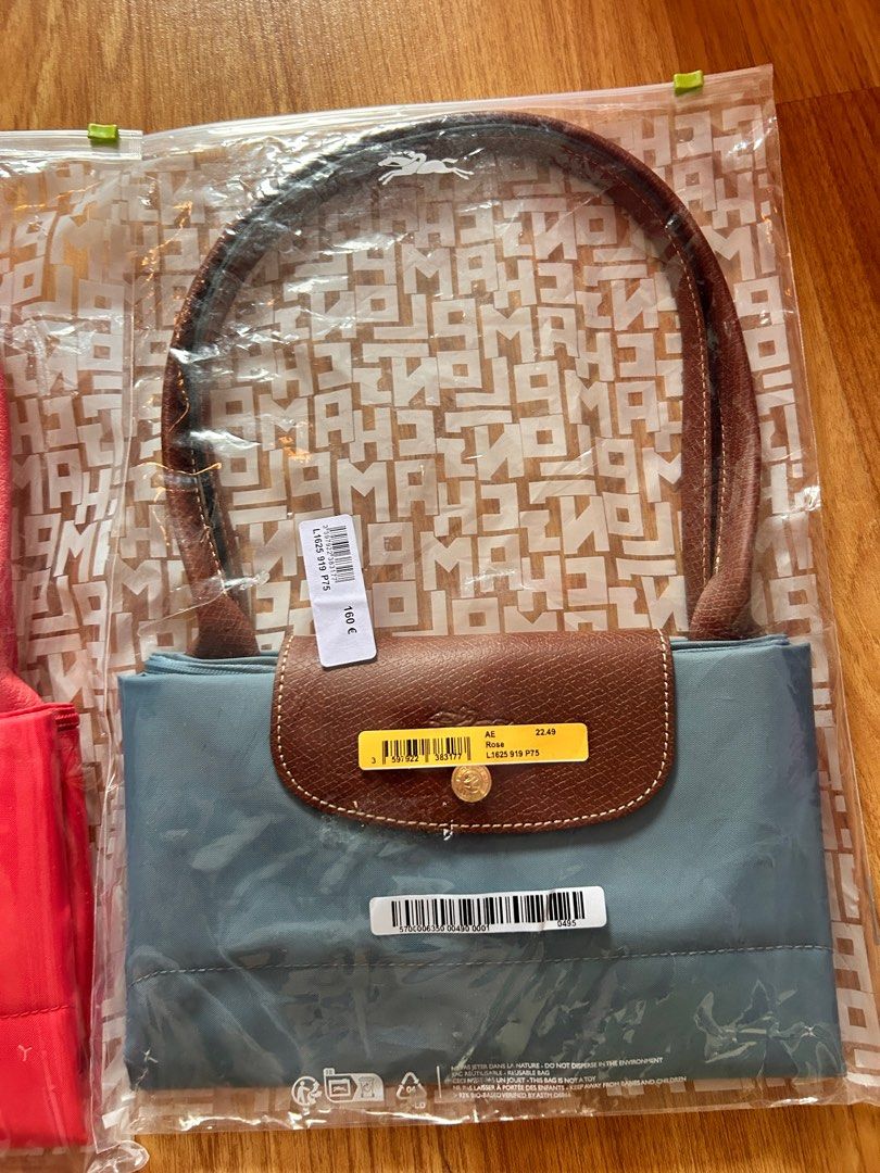 Longchamp plastic bag shop