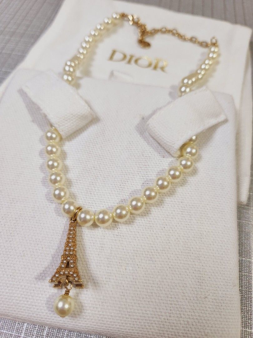 Dior Eiffel Tower Pearl Choker - Authentic (Category: Accessories) located in Singapore. Submitted by stargazer69sg (Listing ID 1297434230, Image 3). Description: Authentic and 99% new with box, dust bag and receipt.Faux Pearl 28cm exclude the chain dangler Free Private Courier after Full Payment Made Price is firm Was $1000.