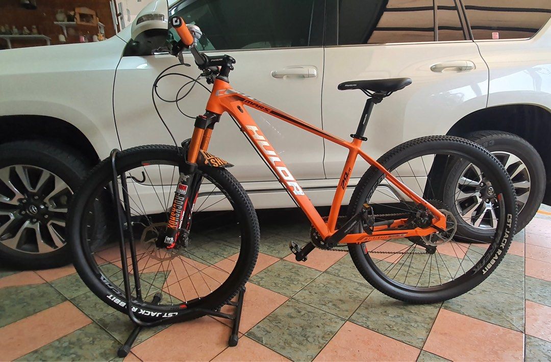 Bright orange mountain bike on sale