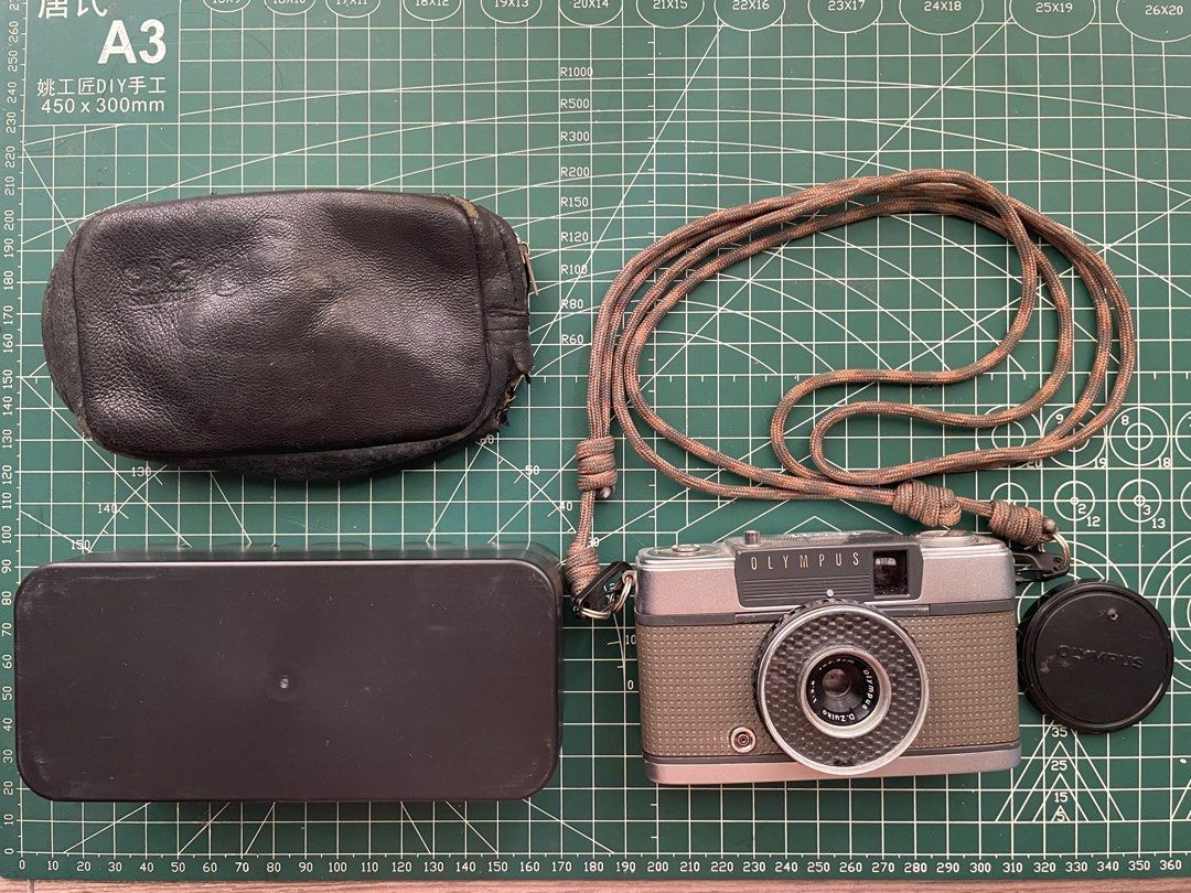 Olympus Pen EE Half Frame Film Camera (Category: Cameras) located in Cavite. Submitted by youknowwhat.cs (Listing ID 1309953285, Image 1). Description: Includes original leather case, loaded film inside, film roll, personally made strap..