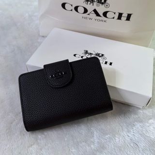 Paubos Sale! All Black Coach medium size wallet zip around