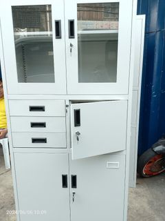 Steel cabinet with safe drawer