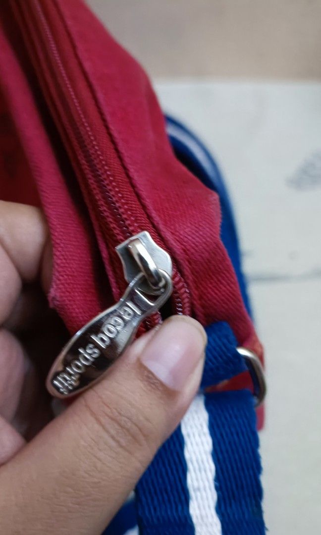 Le coq sportif original vs fake sale