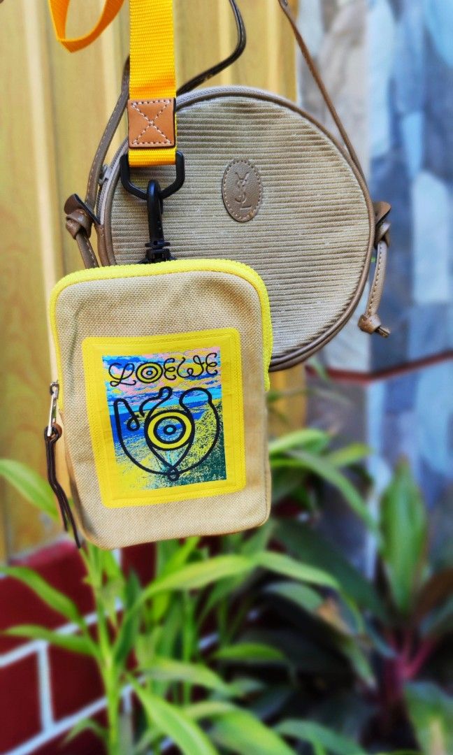 LOEWE NECK SLING BAG (Category: Luxury Bags & Wallets) located in Digos. Submitted by emmanuel28 (Listing ID 1310243255, Image 2). Description: LOEWE EYE NATURE POUCH SLING AUTHENTIC CANVAS MATERIAL MADE IN JAPAN RANK SA (GOOD AS NEW) LOCATION: DAVAO DEL SUR +shipping fee.