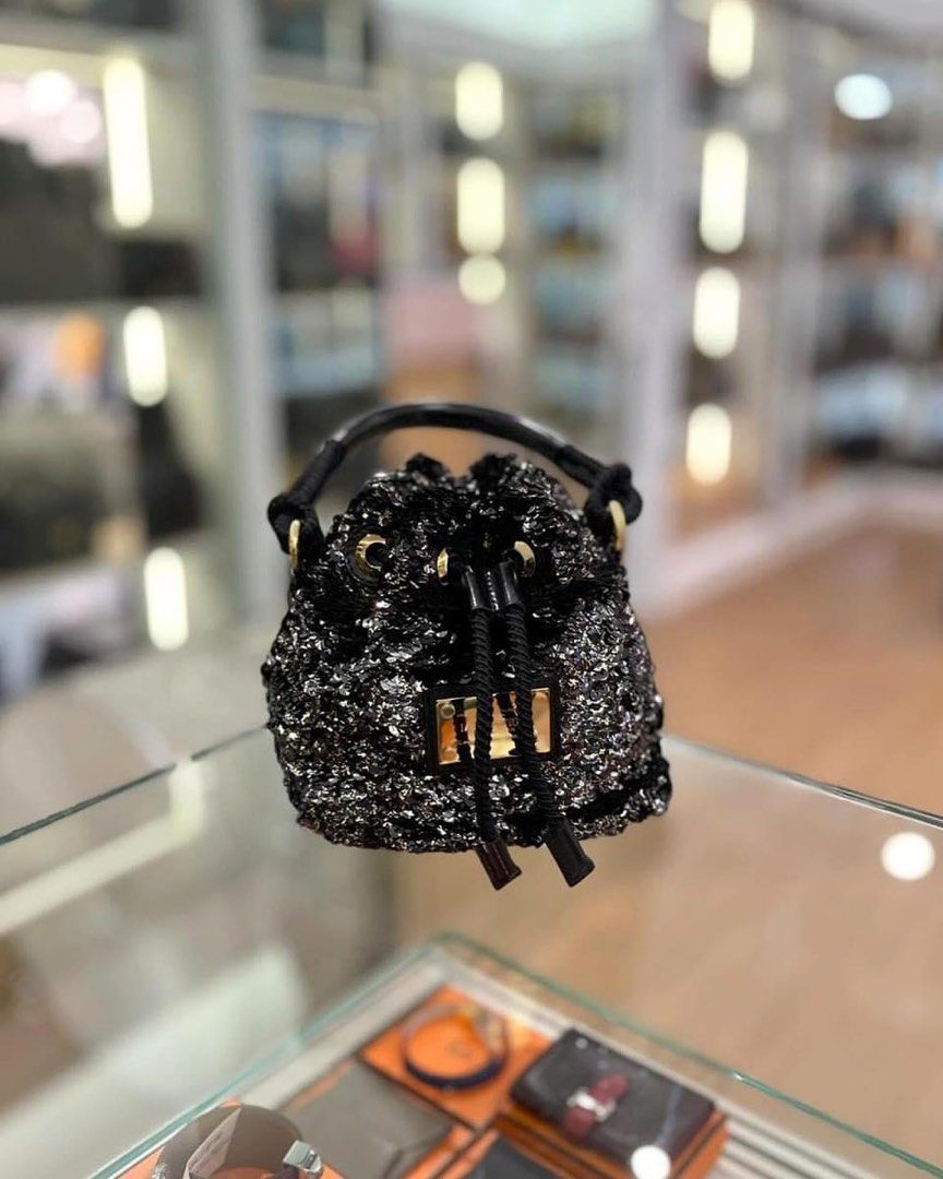Louis vuitton mini drawstring bag clearance