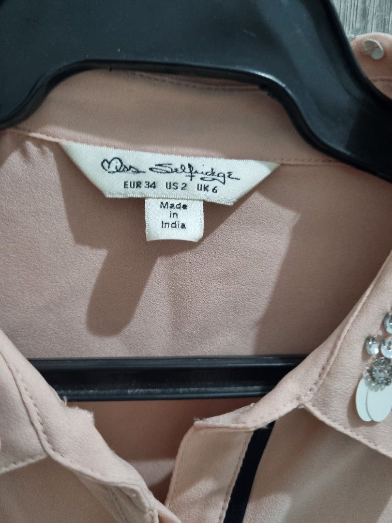Miss Selfridge Long Sleeve Shirt (Category: Blouses) located in Paranaque City. Submitted by declutter_alex (Listing ID 1310181183, Image 3). Description: Fits XS-S body frame RFS: naliitinan na Item in perfect condition. Complete buttons even the embroidery on the collar..