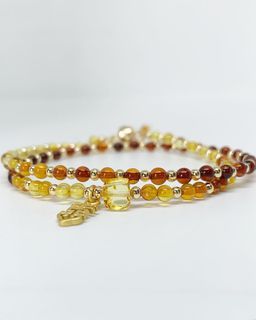 Natural High Quality Two Laps Golden Flower Amber with Blood Amber •