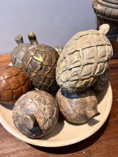 old hand carved wooden pinecones