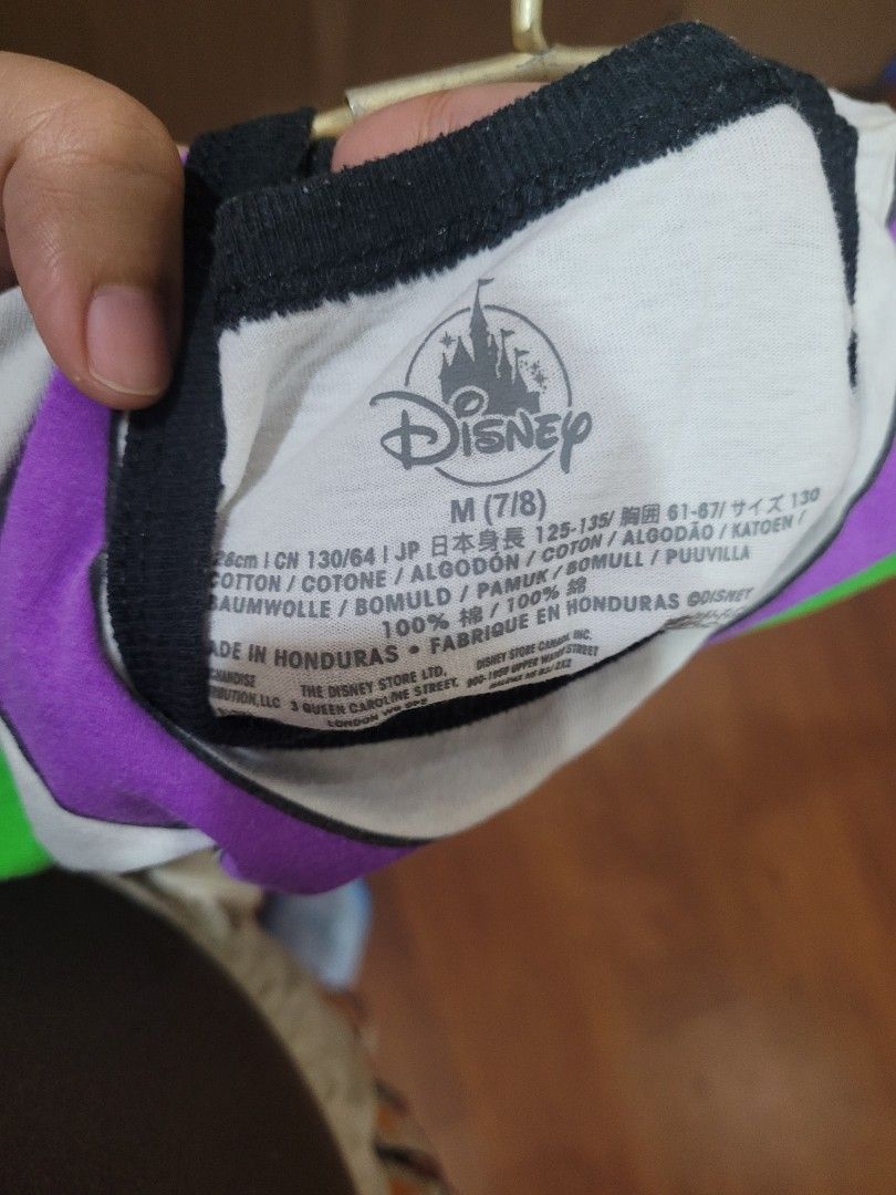 Original Disney Buzz Lightyear Shirt (Category: Babies & Kids Fashion) located in Manila. Submitted by vancecc (Listing ID 1310176257, Image 2). Description: Original Disney from US. Actually unused since my son doesn't want to wear Buzz, but with storage stains at the back :( Selling price REALLY LOW due to the storage stain. Can be used as Halloween costume 😆.