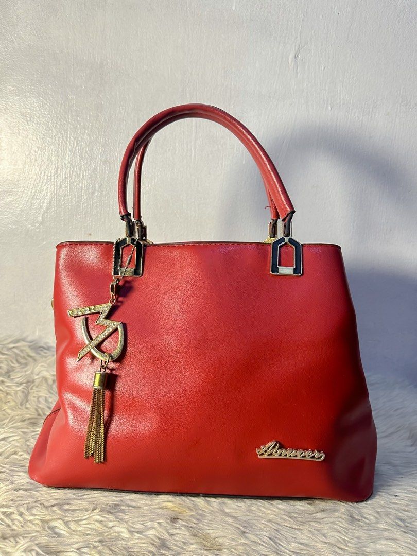 Red formal Crossbody (Category: Cross-body Bags) located in Pasig City. Submitted by Dreamshine (Listing ID 1310251227, Image 1). Description: Red formal Crossbody Pure leather No issue, Like new condition 100% Three compartment, Zipper closure 2way- Sling bag&top handle Gold hardware, no tarnish Semi large size *Wala lang sling strap* :) ❣️San juan manila.