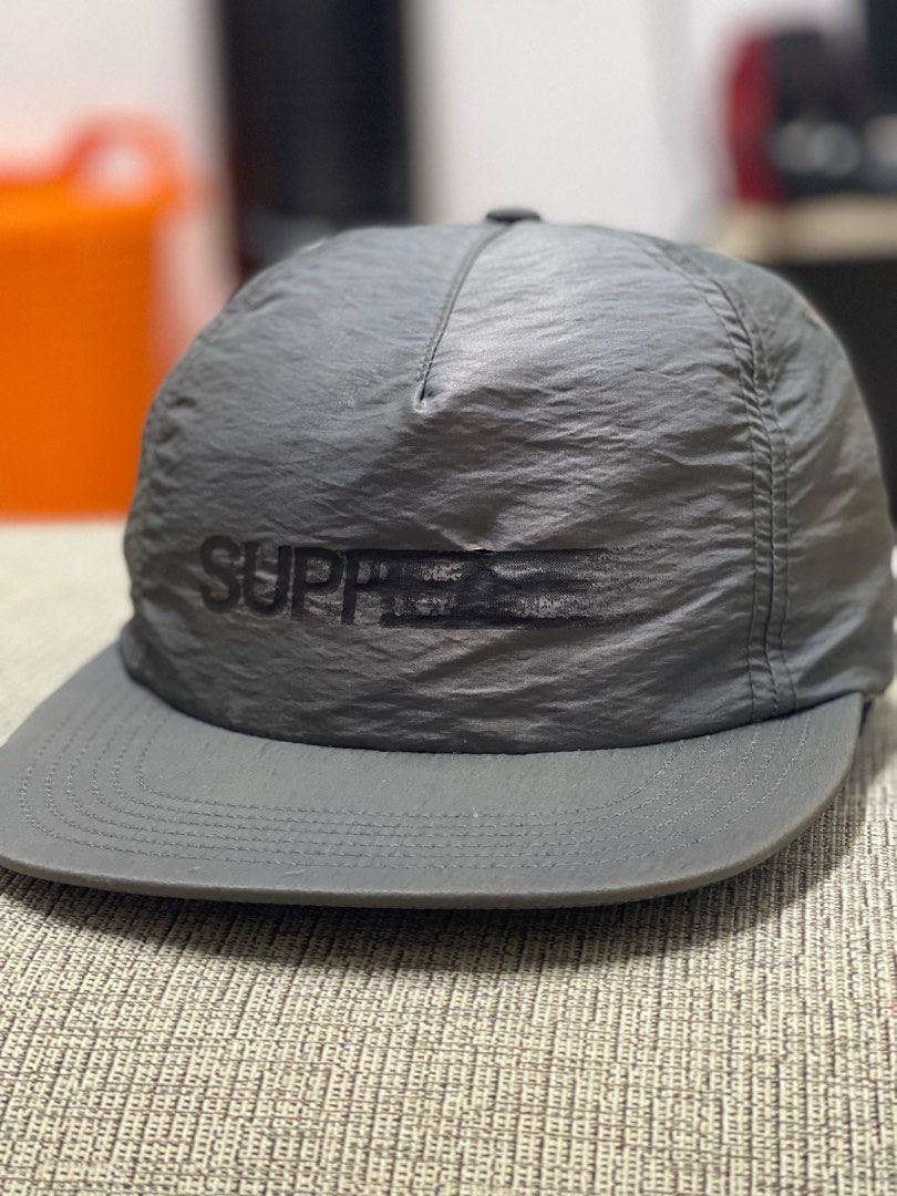 Supreme cap motion logo