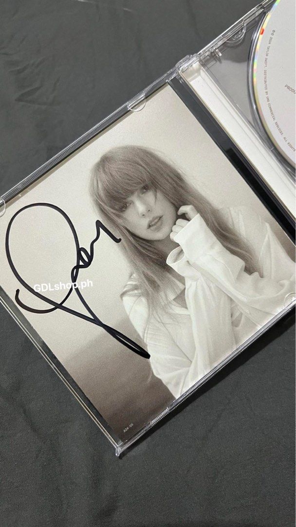 Taylor Swift The Tortured Poets Department Signed TTPD CD (Category: CDs & DVDs) located in Muntinlupa City. Submitted by gdlshop.ph (Listing ID 1310093213, Image 1). Description: Price: P8,000 (Item Price: P7,300 + Airship: P700) 1pcs only. Onhand. Stored in air conditioned room This is a legit, original, officially licensed Taylor Swift merch purchased directly from the band’s record label, store, online store, or licensed distributor..