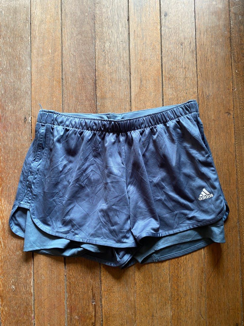 Adidas Marathon 20 TWO-IN-ONE SHORTS (Category: Activewear) located in Batangas. Submitted by cakzero (Listing ID 1310290688, Image 3). Description: Color: Light/Powder Blue Dimensions Width: 28-34 Length: 13 With Compression shorts and Phone Holder see pics for reference Like new.
