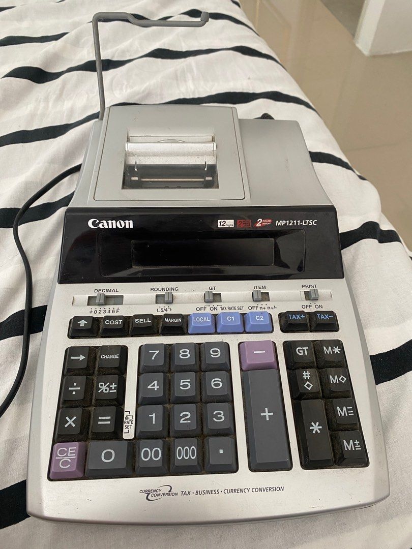 Canon Electronic Calculator for business (Category: Office & Business Technology) located in General Trias. Submitted by crld7 (Listing ID 1310264135, Image 1). Description: Canon MP1211-LTSC Like new Hindi halos nagamit nakatambak lang Mahilig lang sa calculator yung may ari.