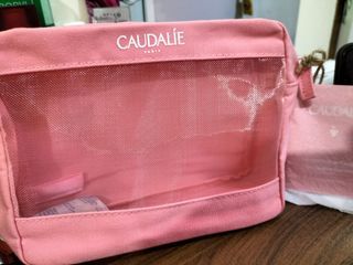 CAUDALIE Paris pink mesh cosmetic pouch