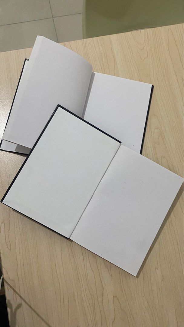 FREE 2 Notebooks (Blank/No lines) (Category: Stationery & School Supplies) located in Mandaluyong City. Submitted by mikoysss (Listing ID 1310373416, Image 2). Description: Free if you buy any 2 items in the listing for their prices posted. Hard-bound cover type. One has one page torn..