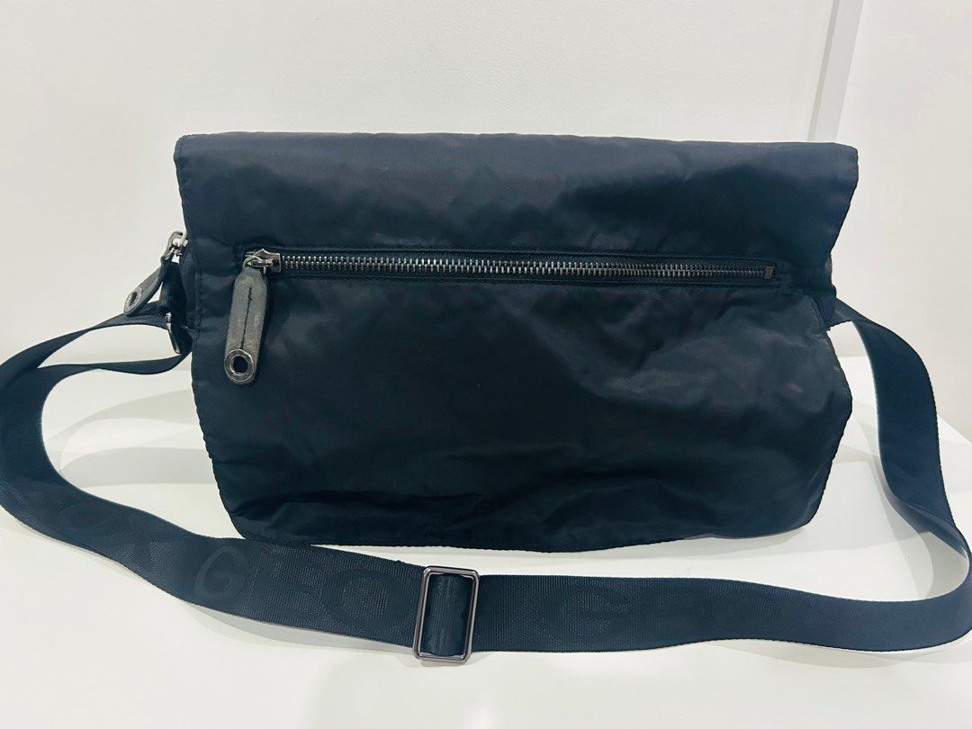 Geox - Black Messenger Bag (Category: Sling Bags) located in Paranaque City. Submitted by cfcisco (Listing ID 1310374605, Image 1). Description: Geox - Black messenger bag. In good condition. No tears. Issue: black leatherette on the zipper and sides pealed off due to long storage. Please see picture.