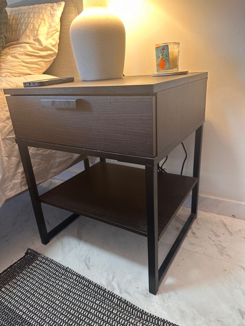 IKEA bedside table (Category: Shelves, Cabinets & Racks) located in Singapore. Submitted by megshmeg (Listing ID 1310323959, Image 2). Description: Cute IKEA bedside table in walnut With one spacious drawer with drawer channel and open storage space Pick up 088642 early July .