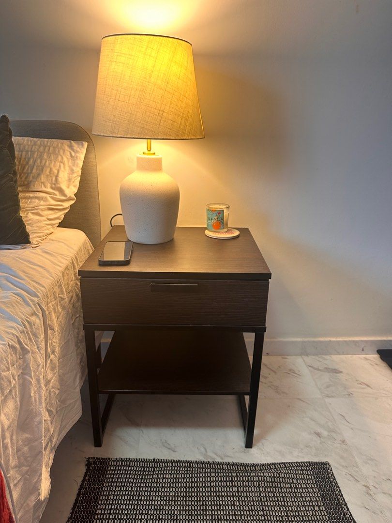 IKEA bedside table (Category: Shelves, Cabinets & Racks) located in Singapore. Submitted by megshmeg (Listing ID 1310323959, Image 1). Description: Cute IKEA bedside table in walnut With one spacious drawer with drawer channel and open storage space Pick up 088642 early July .