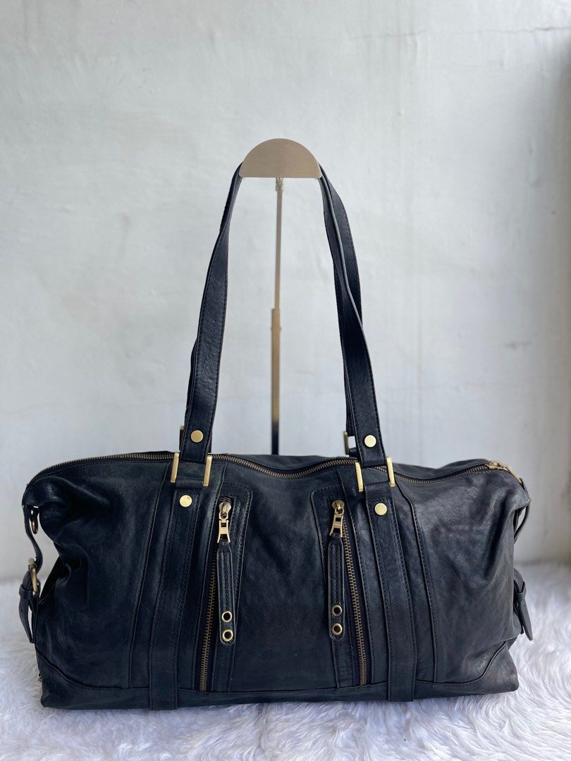 Instinct De Khoon Long black leather rustic bag (Category: Luxury Bags & Wallets) located in Quezon City. Submitted by 1Jippy (Listing ID 1310340509, Image 1). Description: .