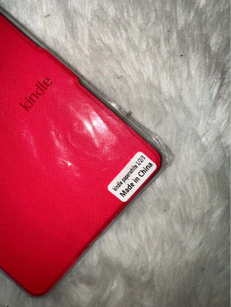 Kindle Case (Category: Cases & Sleeves) located in Quezon City. Submitted by lizellescloset (Listing ID 1310302741, Image 2). Description: For Kindle 1,2,3 Paperwhite color: redish pink with free sunglasses case from Shein.