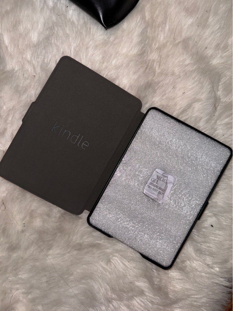 Kindle Case (Category: Cases & Sleeves) located in Quezon City. Submitted by lizellescloset (Listing ID 1310302741, Image 3). Description: For Kindle 1,2,3 Paperwhite color: redish pink with free sunglasses case from Shein.