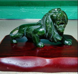 Nephrite or spinach jade lion carved