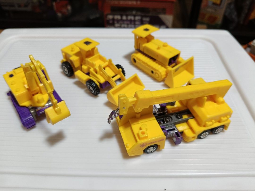 Transformers g2 devastator (Category: Toy Figures) located in Singapore. Submitted by p_don (Listing ID 1310284699, Image 1). Description: Selling loose g2 yellow devastator. Hook had some broken piece. Rest are ok condition. Not for fussy buyer. Buyer please look at my transaction profile before dealing..