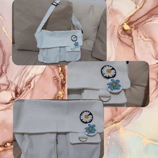 White Sling Bag and Black Waterproof Bagpack with Freebie Pins