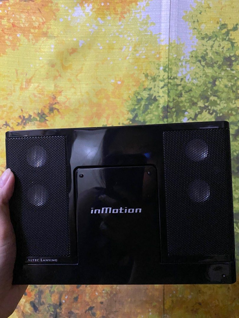 Altec Lansing InMotion Speakers (Category: Soundbars, Speakers & Amplifiers) located in Makati City. Submitted by declutterteacher (Listing ID 1310560337, Image 1). Description: - With iPhone 4/iPod Charger/Stand/Connector - With Cords - With Manual.