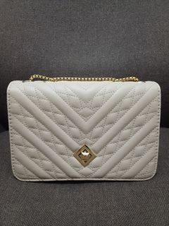 Beige Sling Bag with Gold Chain