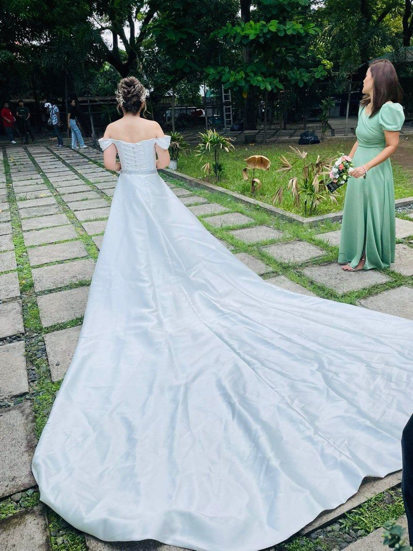 2-Way Minimalist Bridal Gown with side pockets (Category: Evening dresses & gowns) located in Quezon City. Submitted by csb110109 (Listing ID 1310554166, Image 3). Description: Selling my minimalist corset wedding gown used just last June 15, 2024. Worth 30k wedding gown -best fits medium to large frame but adjustable since it is corset style - with side pockets -looks way better and classier in actual! -used only once -selling low for PhP14k onl