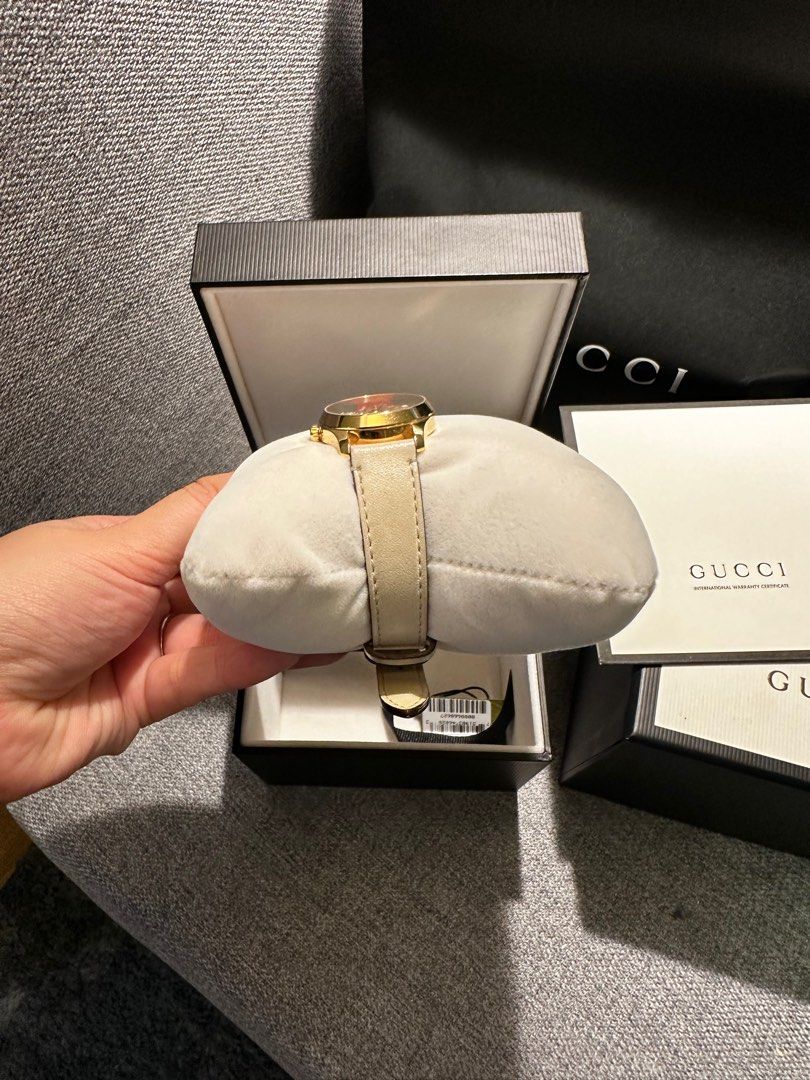 Gucci watch offwhite color (Category: Luxury Watches) located in Paranaque City. Submitted by primrose21 (Listing ID 1310558130, Image 3). Description: Comes with everything seen in the photos You can replace the leather if you want :).