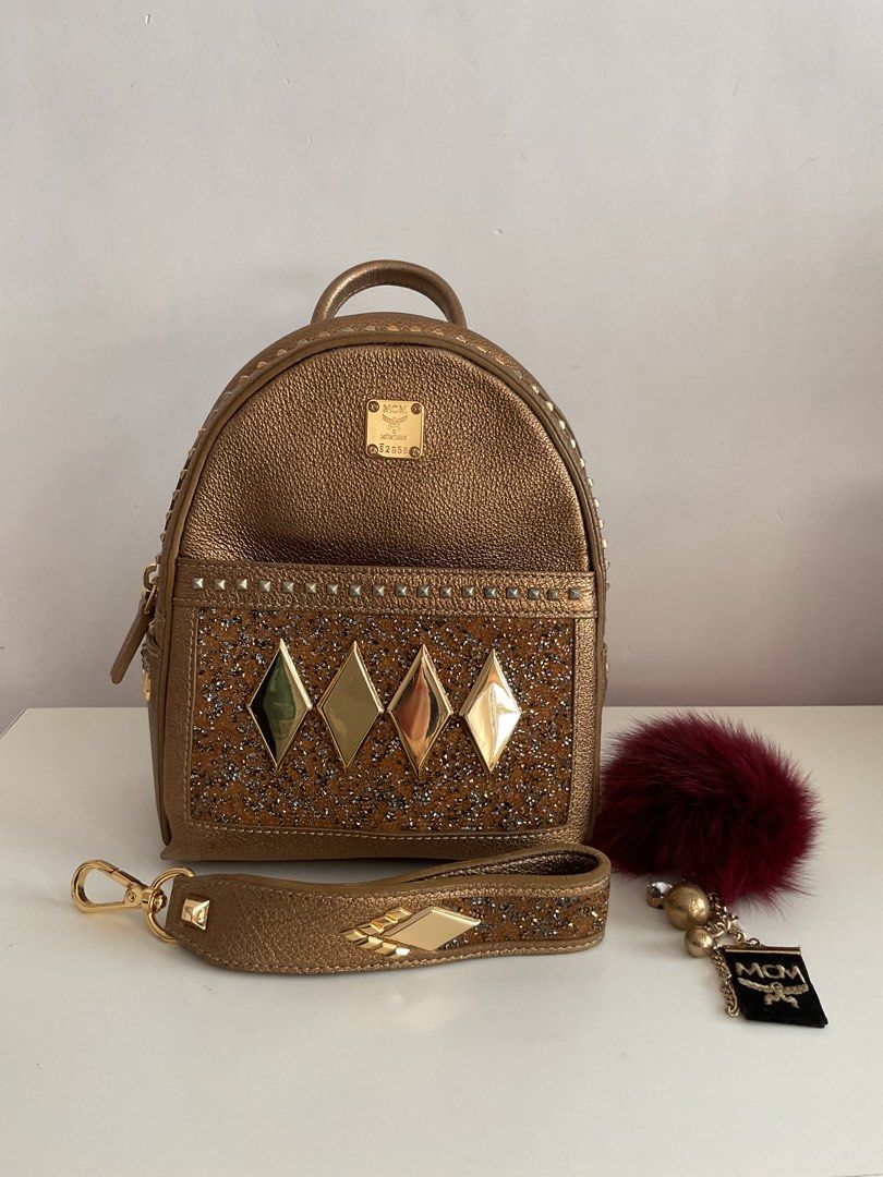MCM extra mini backpack crossbody bag swarovski with studs Carousell