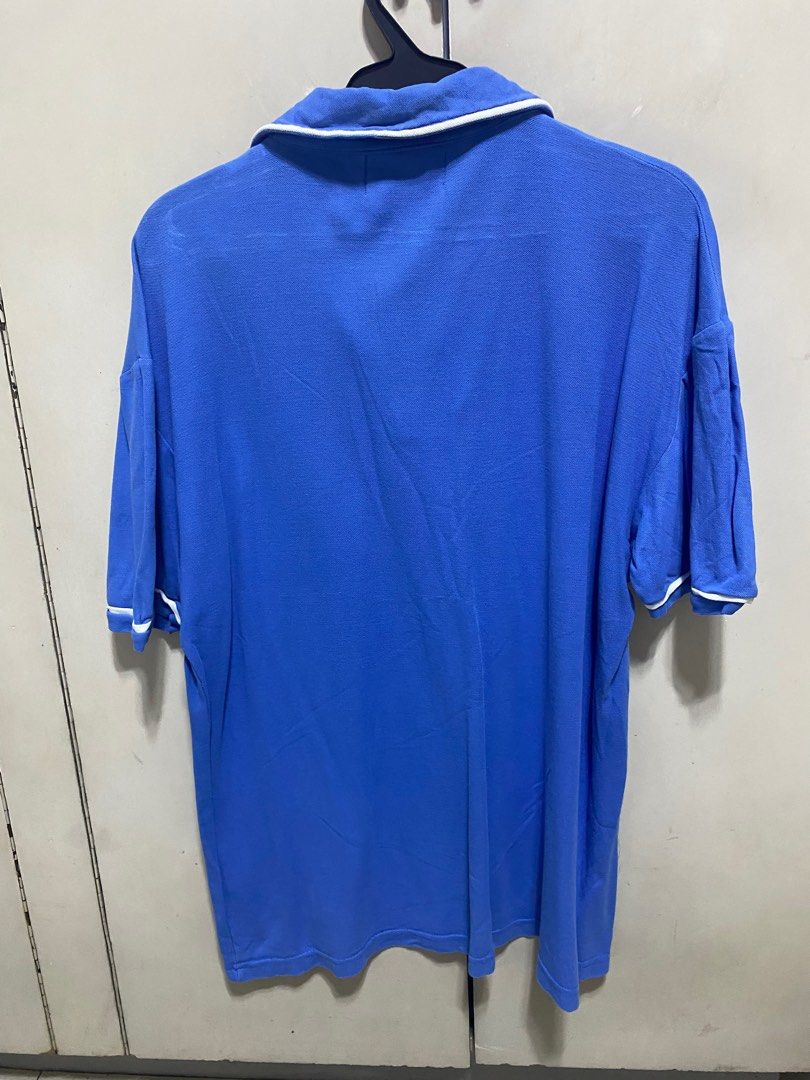 Penguin - Blue Polo Shirt (Category: Tshirts & Polo Shirts ) located in San Juan City. Submitted by random_finds (Listing ID 1310552720, Image 2). Description: Decluttering old and used shirts. As is and used condition. Please check photos for reference on quality.