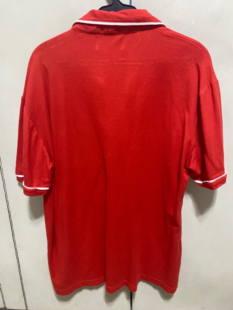 Penguin - Red Polo Shirt (Category: Tshirts & Polo Shirts ) located in San Juan City. Submitted by random_finds (Listing ID 1310552551, Image 2). Description: Decluttering old and used shirts. As is and used condition. Please check photos for reference on quality.