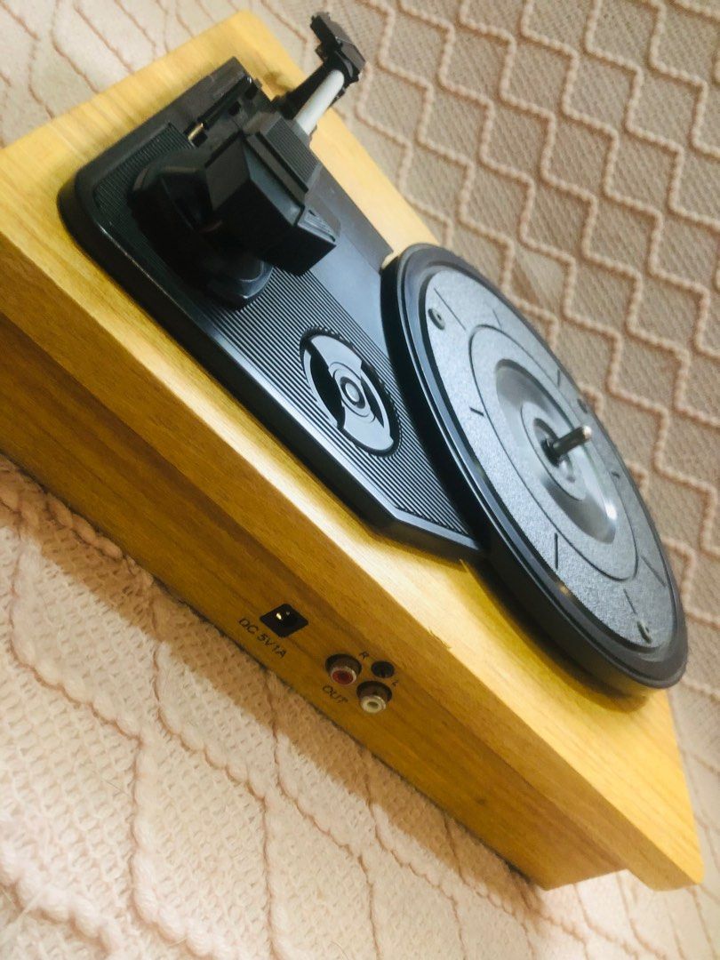 Record Player (Category: Portable Music Players) located in Manila. Submitted by shop.camay (Listing ID 1310498407, Image 2). Description: - complete w/ box - needs speaker - has a jock issue but plays well .
