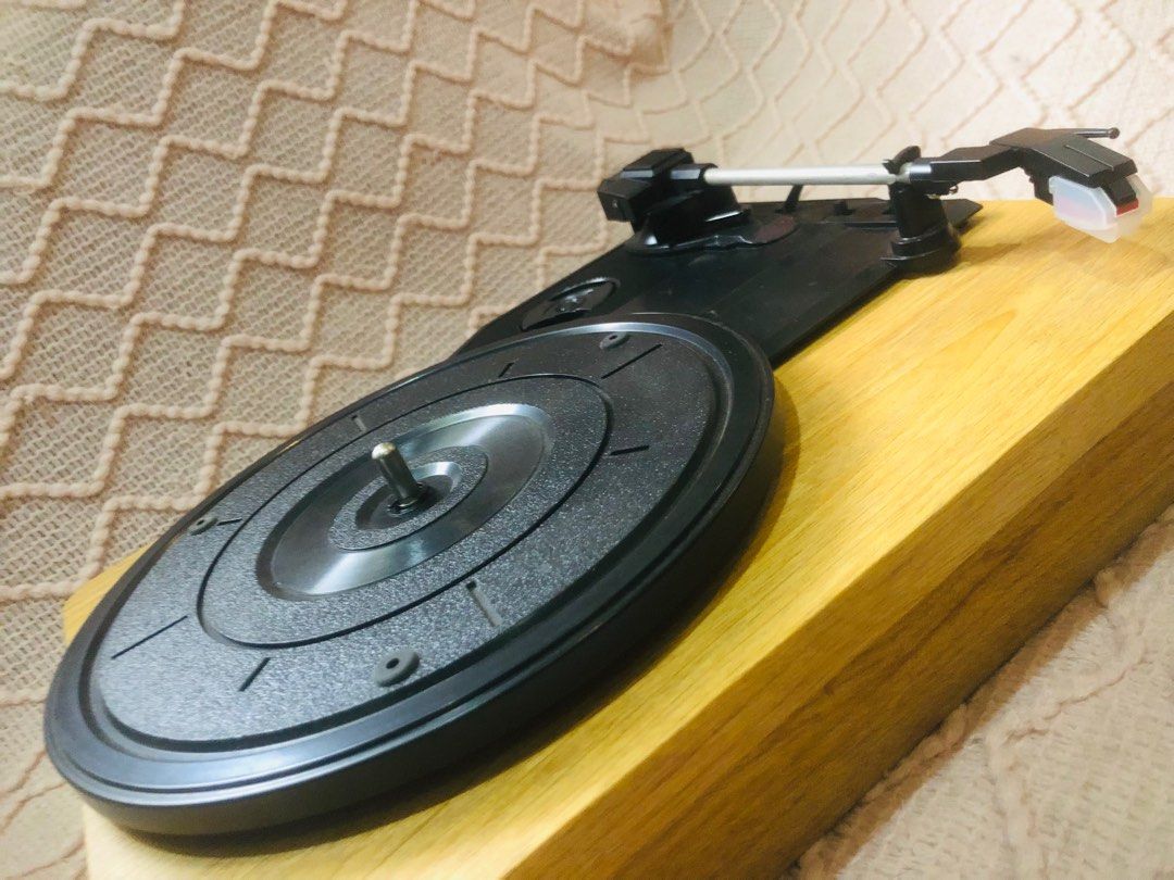 Record Player (Category: Portable Music Players) located in Manila. Submitted by shop.camay (Listing ID 1310498407, Image 1). Description: - complete w/ box - needs speaker - has a jock issue but plays well .