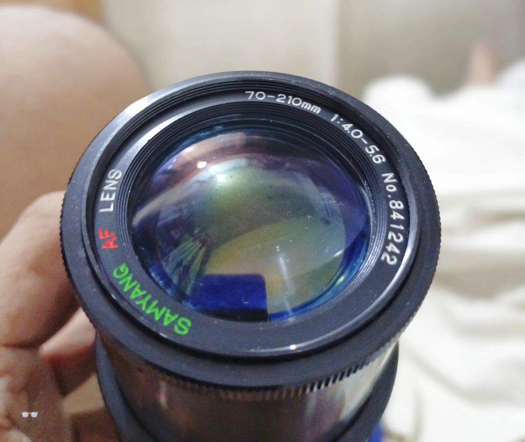 Samyang 70-210mm (Nikon mount) (Category: Lens & Kits) located in Manila. Submitted by benediction24 (Listing ID 1310553941, Image 2). Description: samyang 70-210mm vintage lens Nikon mount SWAP SWAP sa badminton racket.