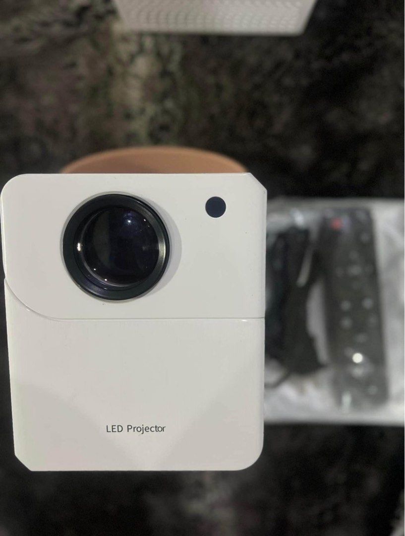 Smart Projector Android Supported 4k HD Brand New‼️ (Category: Projectors) located in Manila. Submitted by reluxx_deals (Listing ID 1310501566, Image 1). Description: FEATURES: •8000 Lumens •4K HD Resolution •Projective Light Source Life: 50,000 hours •Projection Size: 50 - 300 inches •Brightness: 1200 ANSI •Android V12 •Projection Distance: 0.8 - 5m9 •Supported with Play store, Bluetooth, Wi-fi, USB, Wifi Display •With Netflix, Youtube, Disney, 