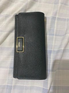 TUMI WALLET (with tag)