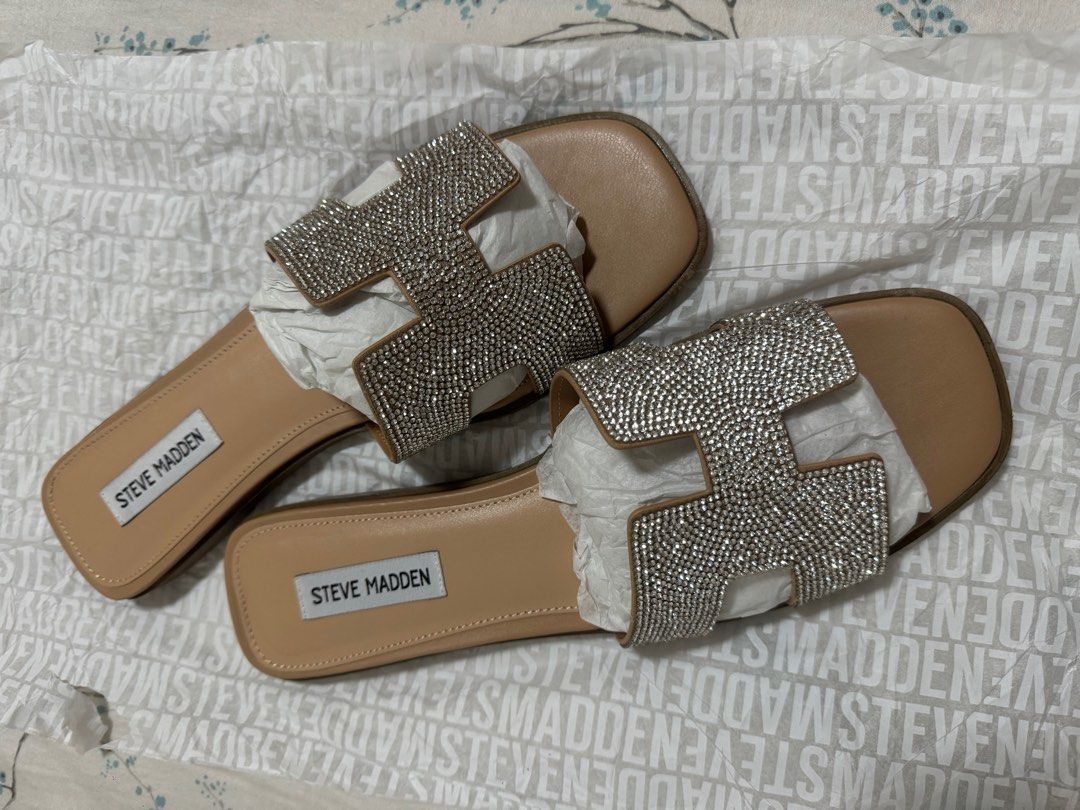 Authentic Steve Madden Hadyn Slides with Rhinestones (Category: Slippers and slides) located in Quezon City. Submitted by frostize (Listing ID 1310702400, Image 2). Description: Kararating lang fresh from US. Pinabili ko but since true size sya, pang size 8.5 to 9 lang ako. SF shouldered by buyer Handling fee shouldered by buyer for meetup.