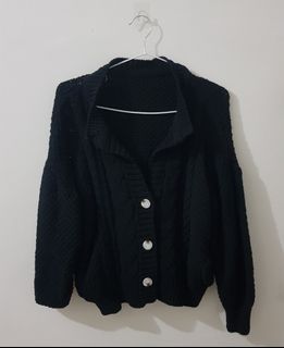 black knitted crocheted cardigan